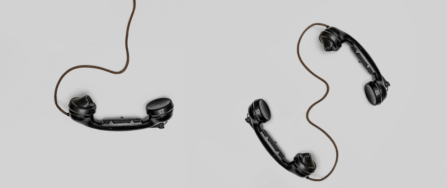 A pair of handsets with cord

AI-generated content may be incorrect.