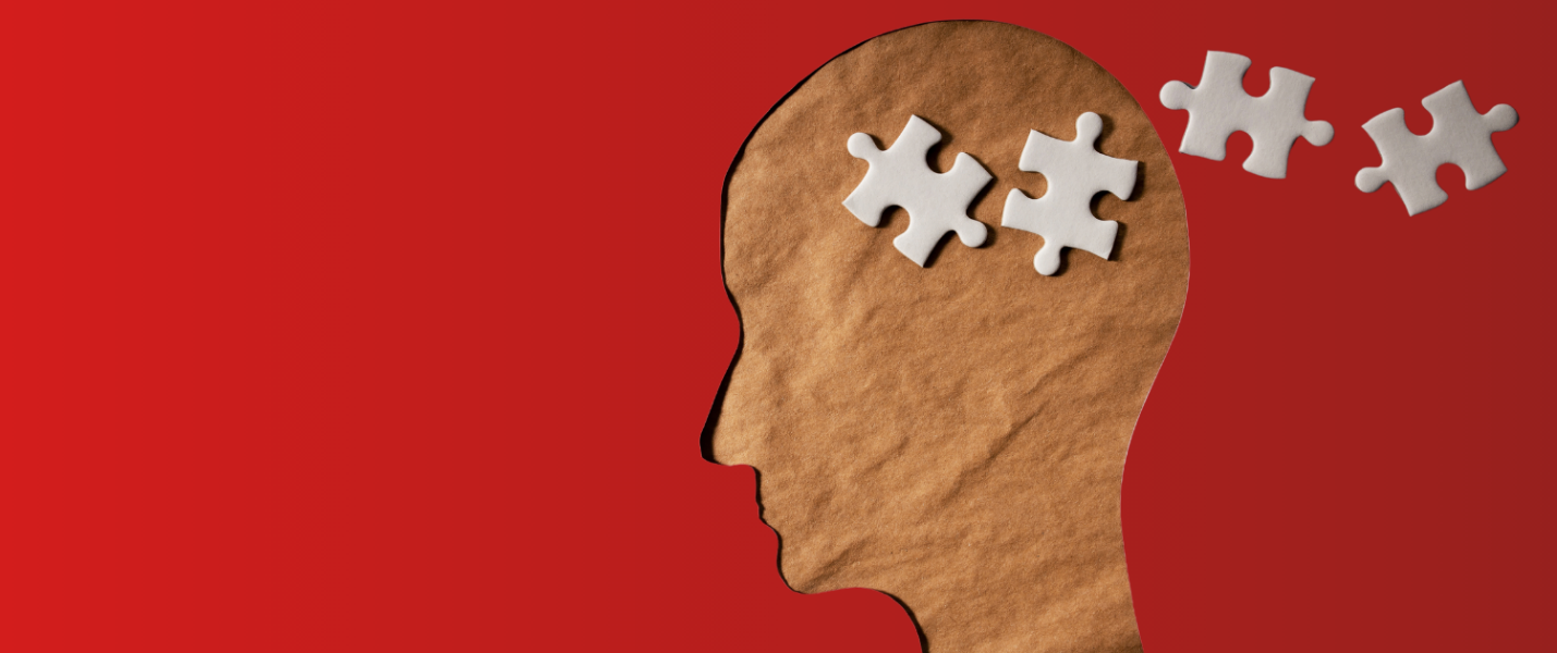 A puzzle pieces in the head of a person

Description automatically generated