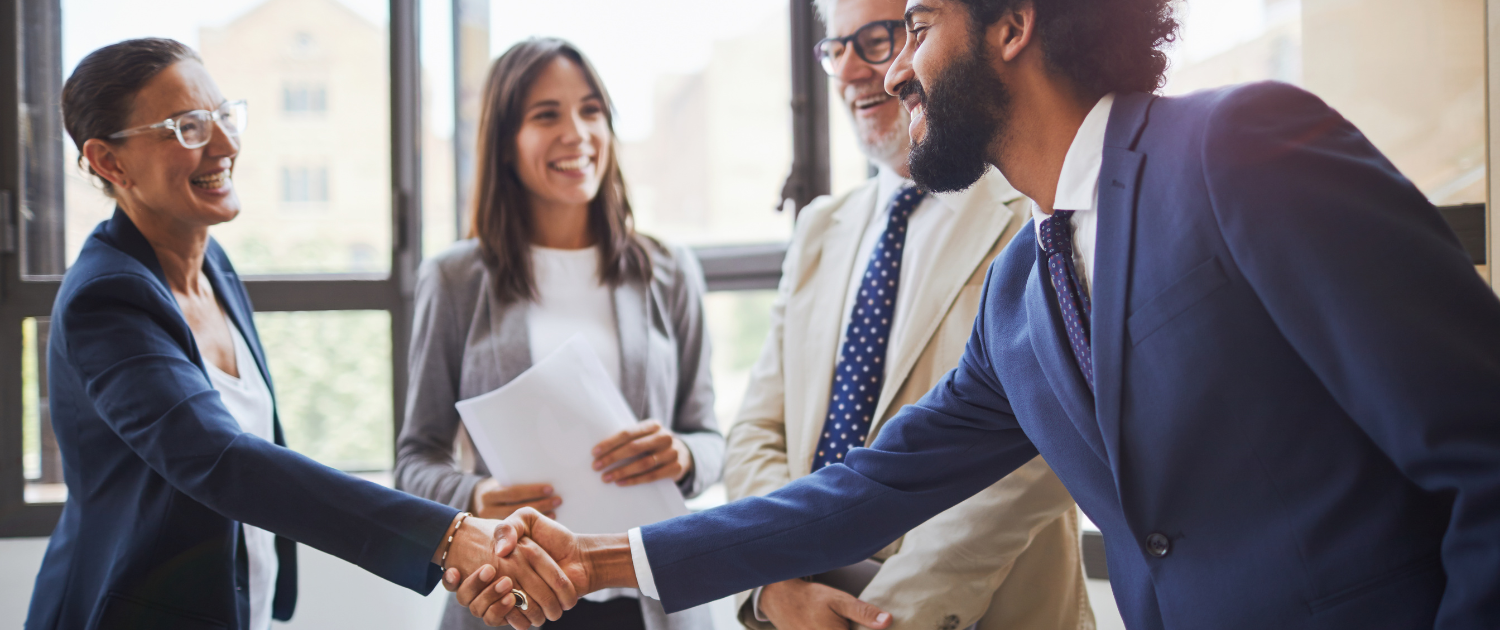 A person shaking hands with a person

AI-generated content may be incorrect., Picture