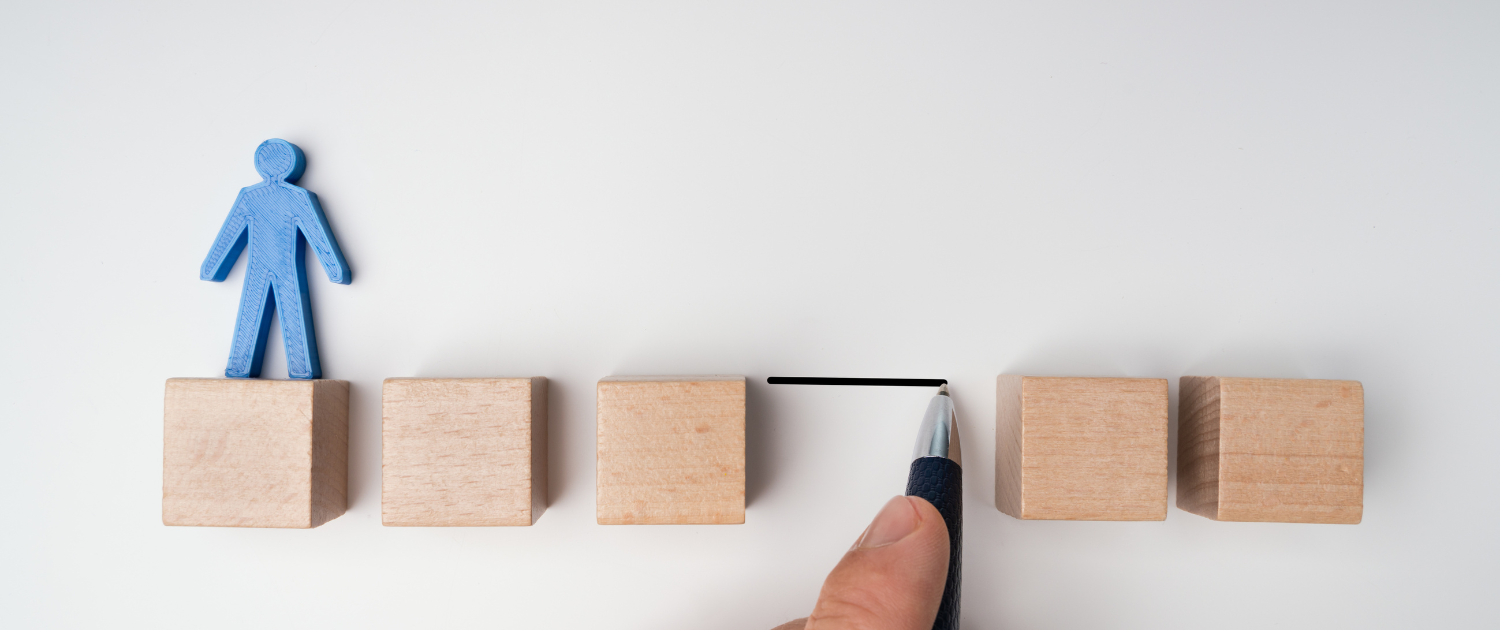 A hand holding a pen and drawing a line of wooden blocks

AI-generated content may be incorrect., Picture