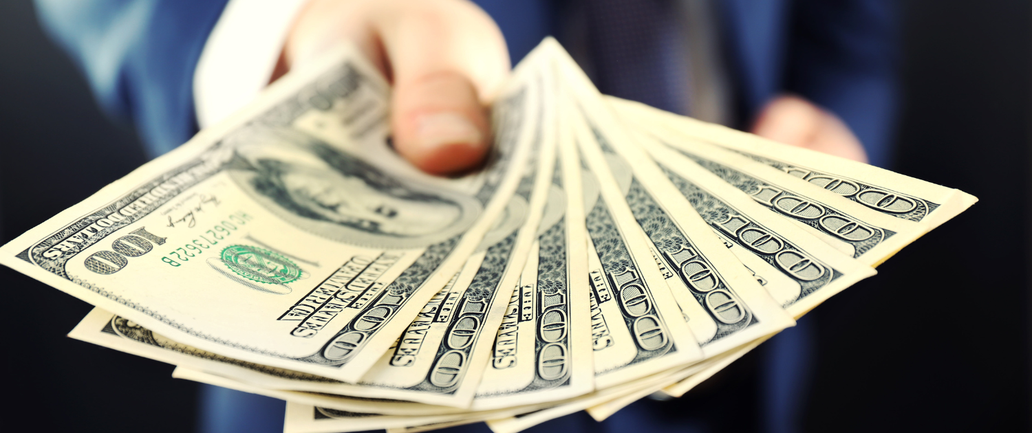 A hand holding a fan of money

AI-generated content may be incorrect., Picture